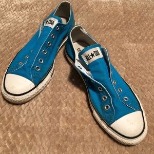 Converse, blue, no lace/slip-ons, worn.